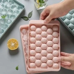 Promo ⭐ Innovatique Ronde Ijsblokjesvorm Met Deksel - 2 Stuks - Roze - 66 Ronde Mini Ijsblokjes - ø 1,5cm - Stofvrij - Plooibaar - Bioplastic - Ice Cube - Makkelijk Te Vullen - Zonder Morsen ⭐ -Tefal Shop 550x609 1